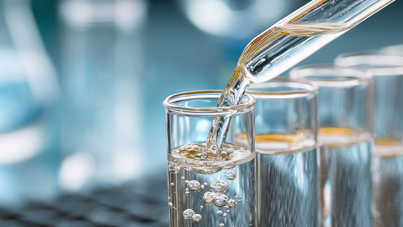 Water Analysis. water in a test tube for checking the content of chemicals.